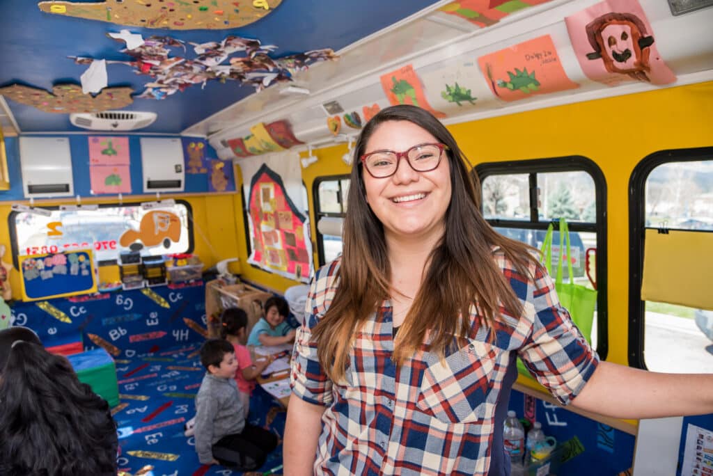 El Busesito IDEAS Impact teacher & students inside bus